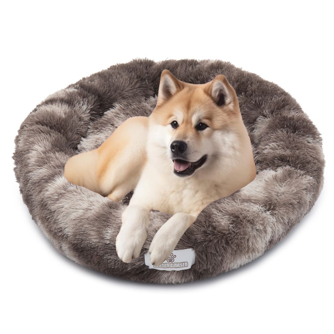 Hund schläft im Donut Hundebett Wolke 7
Flauschiges Hundekissen für kleine Hunde