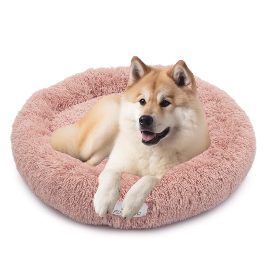 Hund schläft im Donut Hundebett Wolke 7
Flauschiges Hundekissen für kleine Hunde